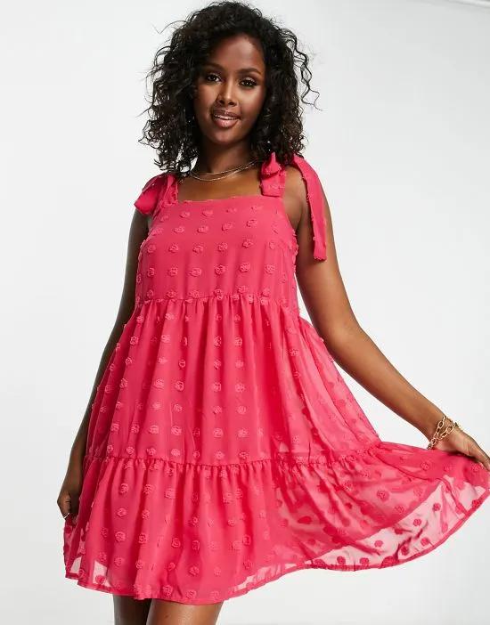 jacquard swiss dot tiered mini dress with shoulder bows in bright pink