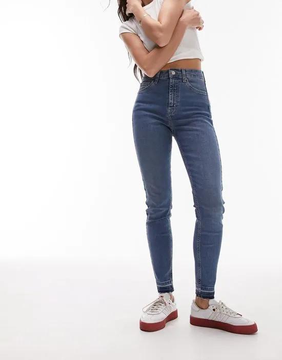 Jamie jeans with let down hem in mid blue