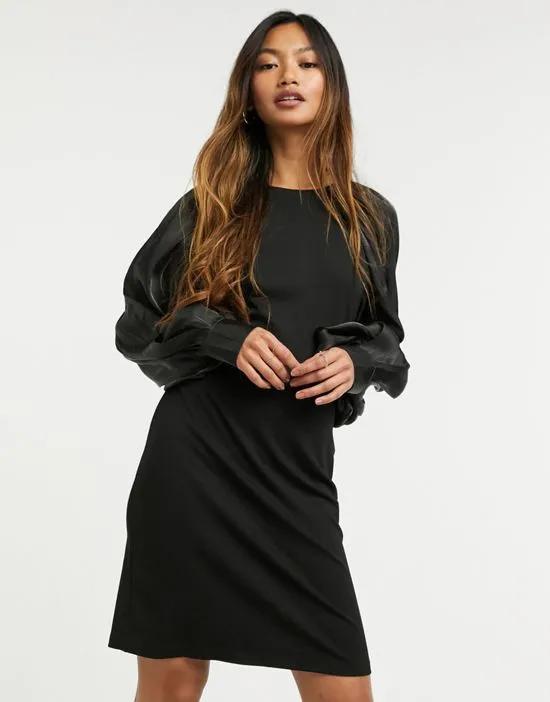 jersey mini dress with column sleeve in black