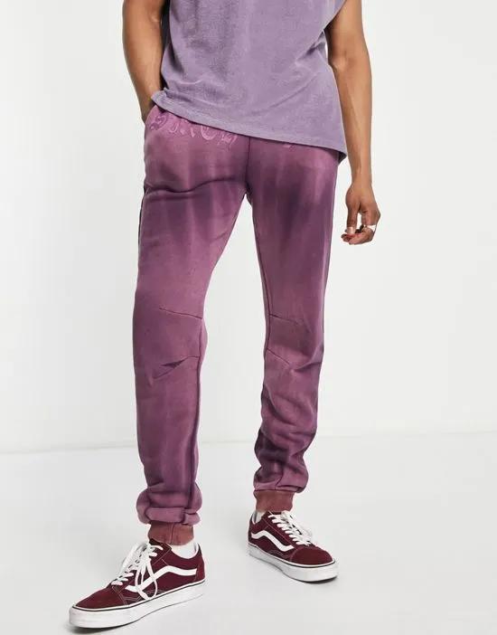 jersey sweatpants in purple tie dye with tonal logo print - part of a set
