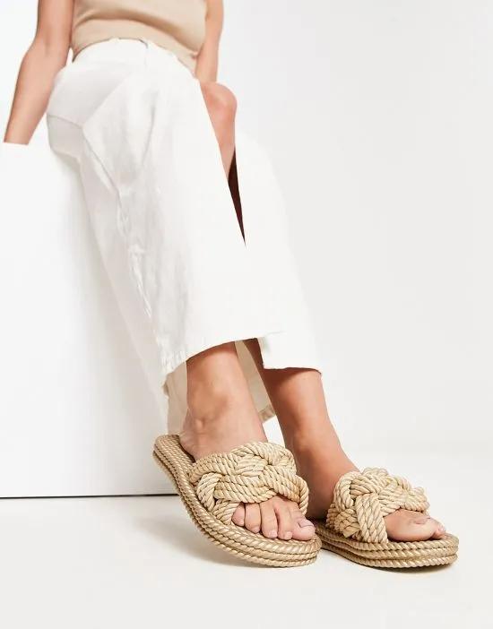 Jinx knot jelly sandals in gold