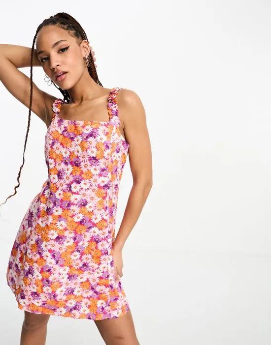 Kitty tie back mini dress in purple and orange floral