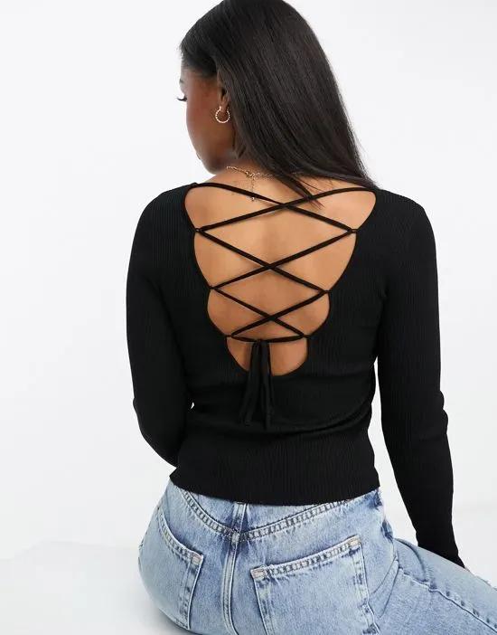 knit top with cross back detail in black