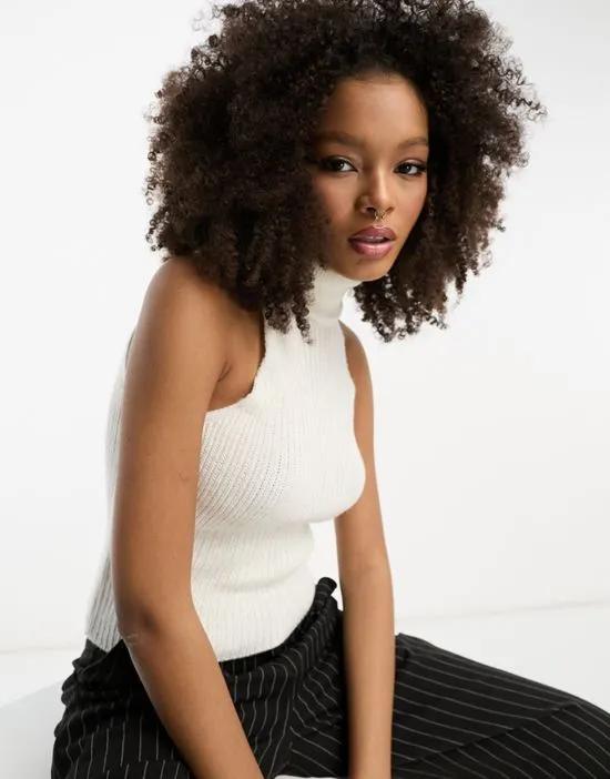 knitted sleeveless top with roll neck in cream