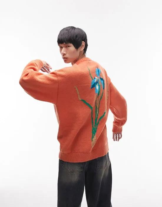 knitted sweater with floral back placement in orange