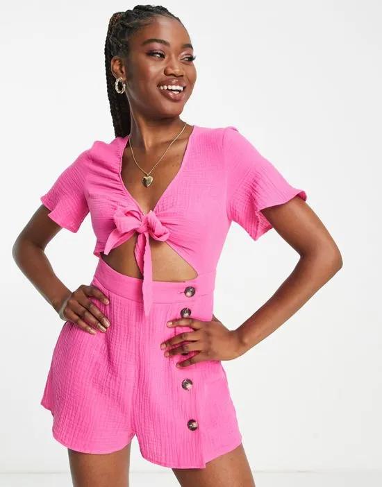 knot front button detail romper in pink