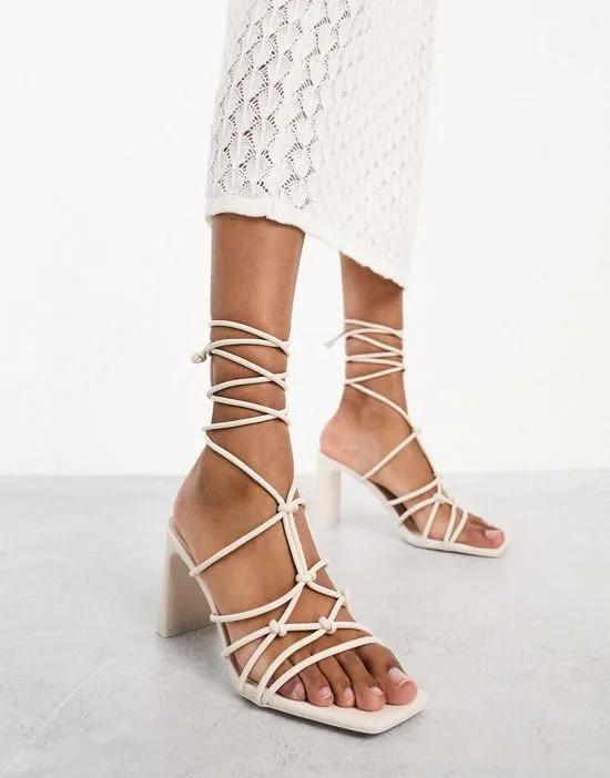 knot front strappy heeled sandal in beige