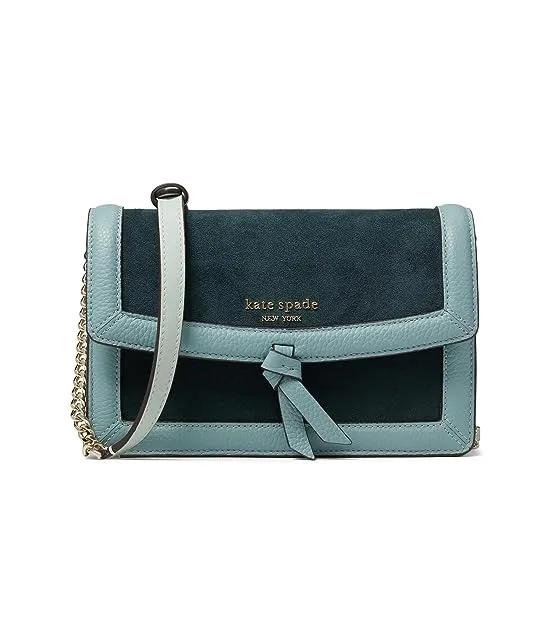 Knott Color-Blocked Pebbled Leather and Suede Leather Flap Crossbody