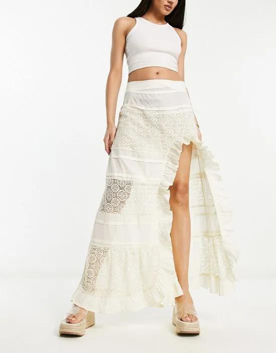 lace insert and embroidered maxi skirt with side split in cream