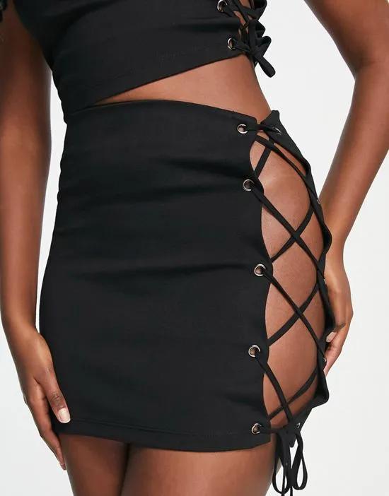 lace up side mini skirt in black - part of a set
