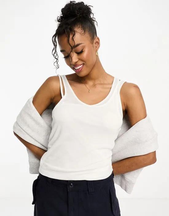layered tank top with asymmetric strap detail in white