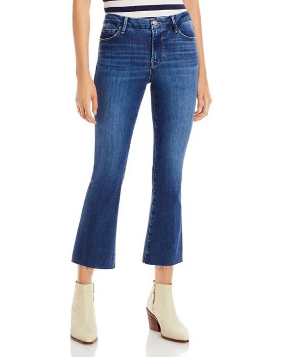 Le Cropped Mini Mid Rise Bootcut Jeans in Lupine