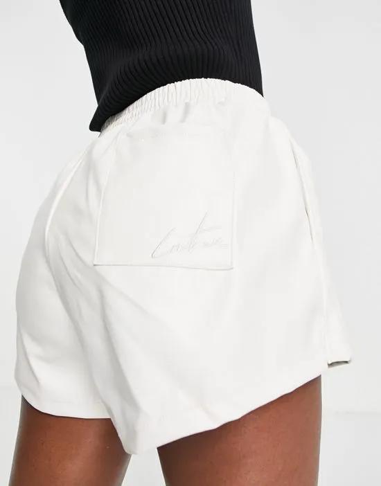 leather look boxer shorts in stone
