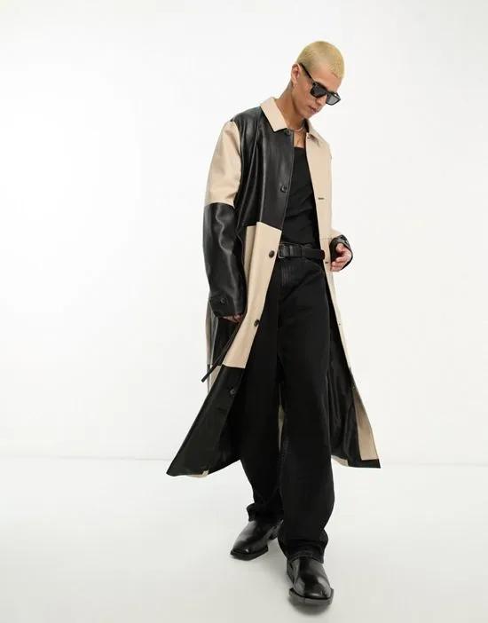 leather look cut and sew trench coat in black and white