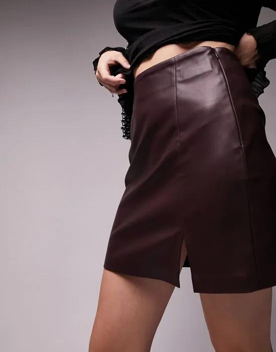 leather look slit detail mini skirt in burgundy