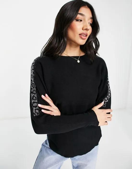 leopard sleeve sweater in black