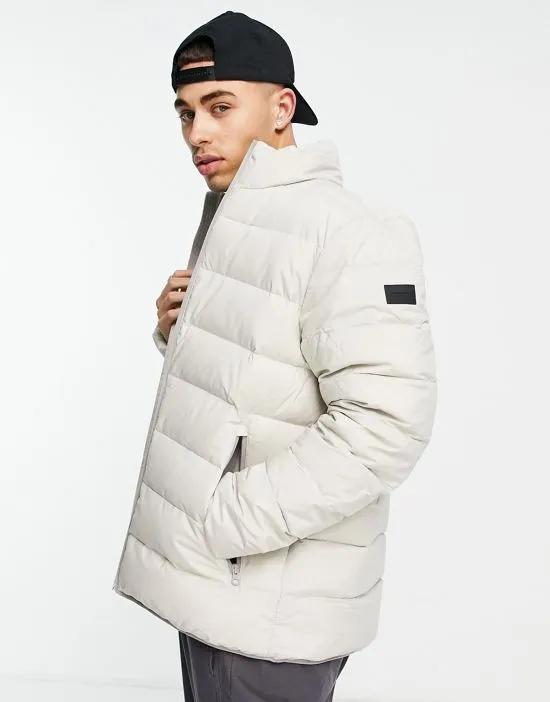 lightweight hooded puffer jacket in stone