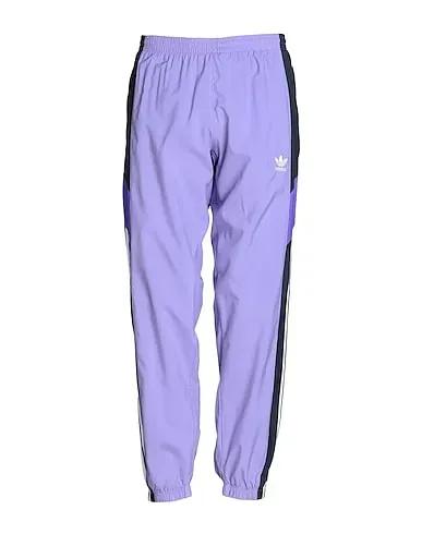 Lilac Casual pants adidas REKIVE WOVEN TRACKPANT
