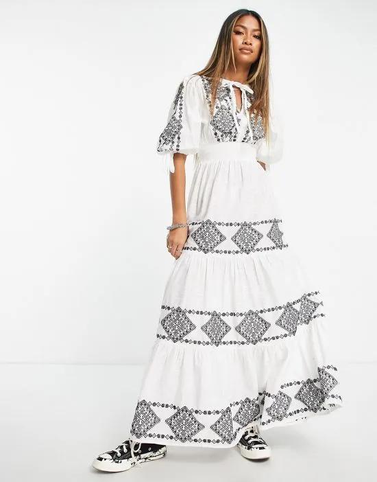 limited edition maxi smock dress in white with contrast black embroidery