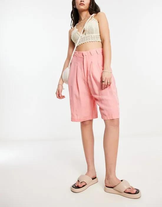 linen high rise longline shorts in coral