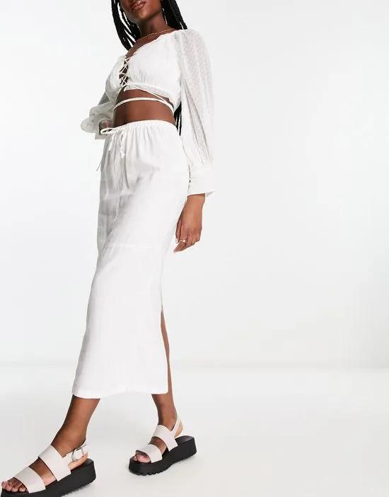 linen parachute midi skirt in white