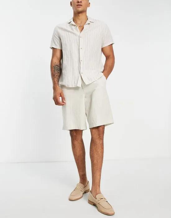 linen shorts in off white