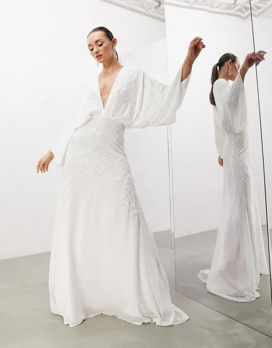 Lisa drape sleeve plunge wedding dress with floral embellishment in ivory