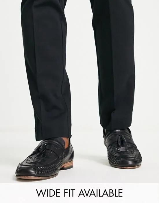 loafers in woven black leather with tassel detail