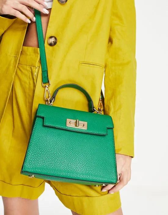 lock detail bag with top handle and detachable crossbody strap in green