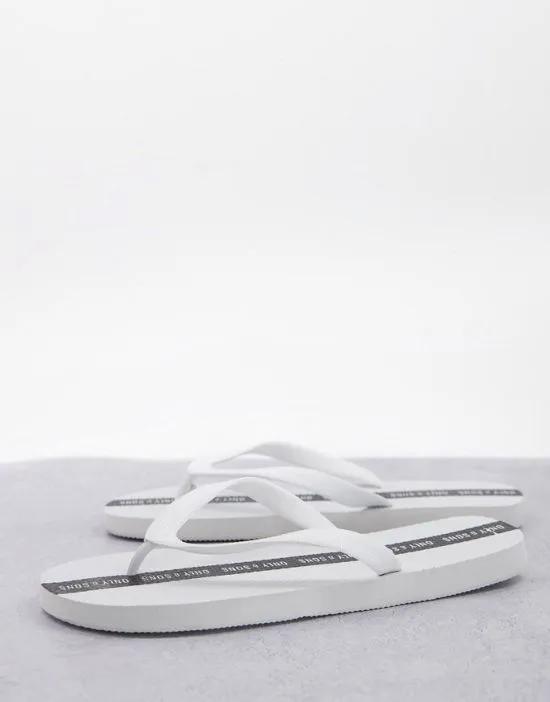 logo flip flops in white