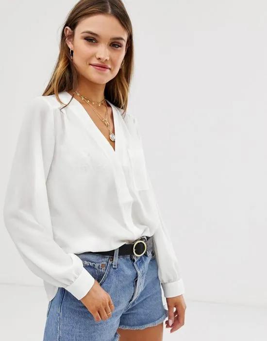 long sleeve blouse with pocket detail in Ivory