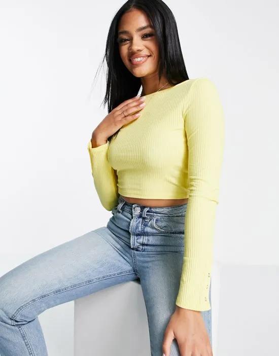 long sleeve crop top with snap cuff in lemon