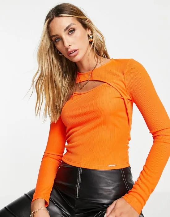 long sleeve cut out front top in orange
