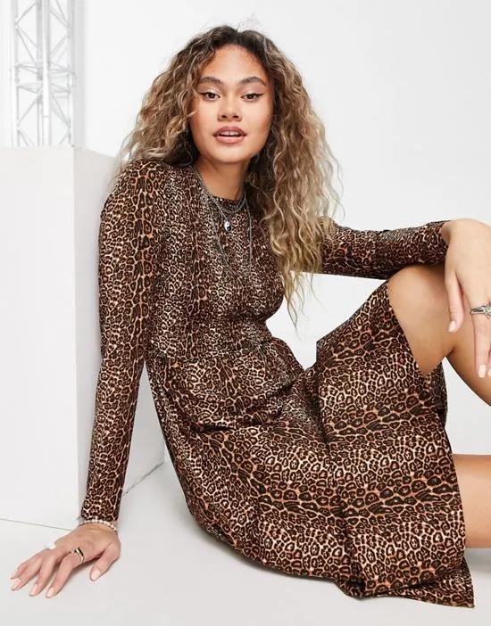 long sleeve midi dress with shirred bodice in grunge leopard