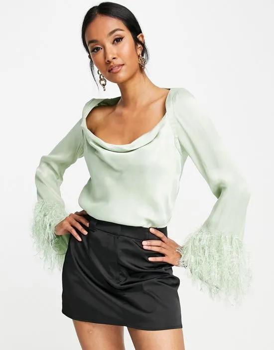 long sleeve top with feather cuff detail in sage