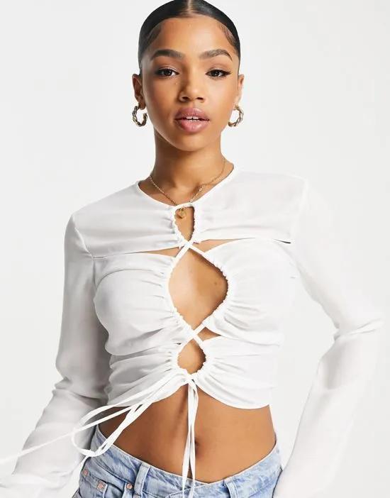 long sleeve top with ruched keyhole detail in white
