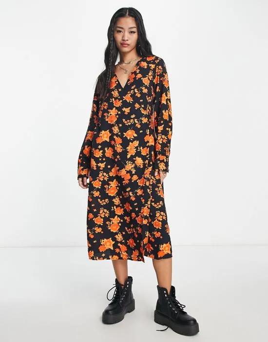 long sleeve wrap midi dress in orange floral