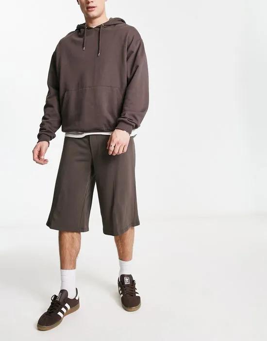 longer length smart shorts with belt details in brown