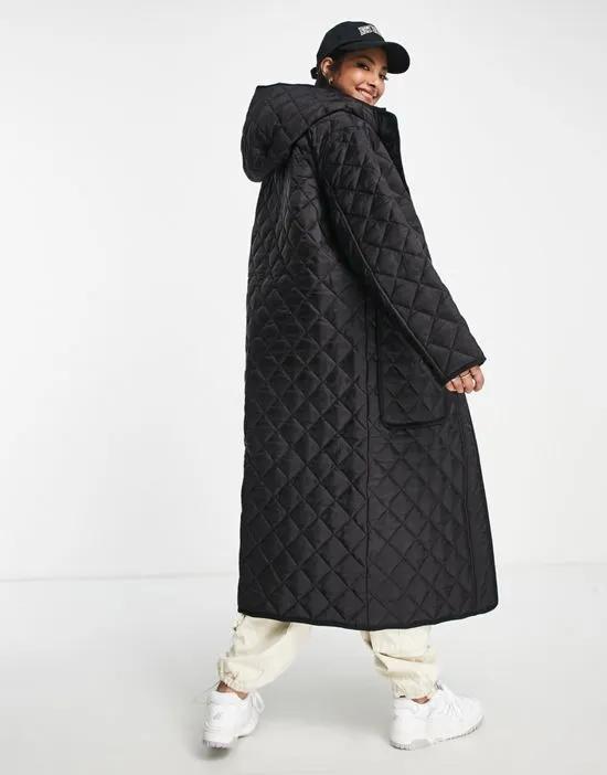 longline padded coat in black