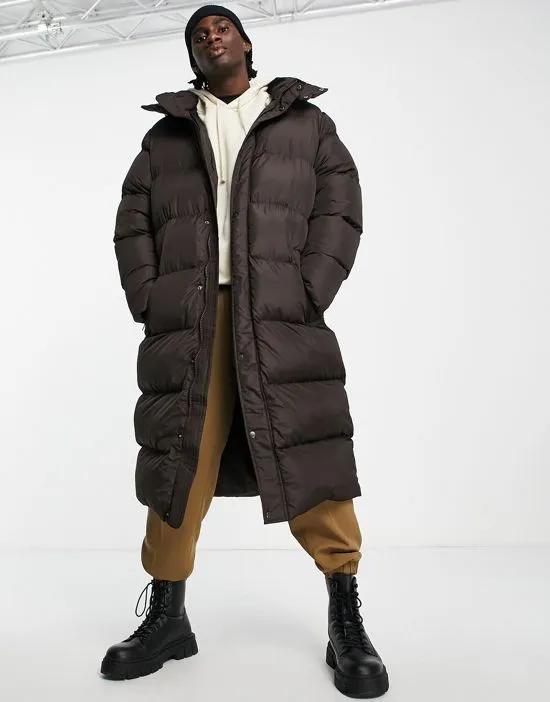 longline quilted puffer coat in brown
