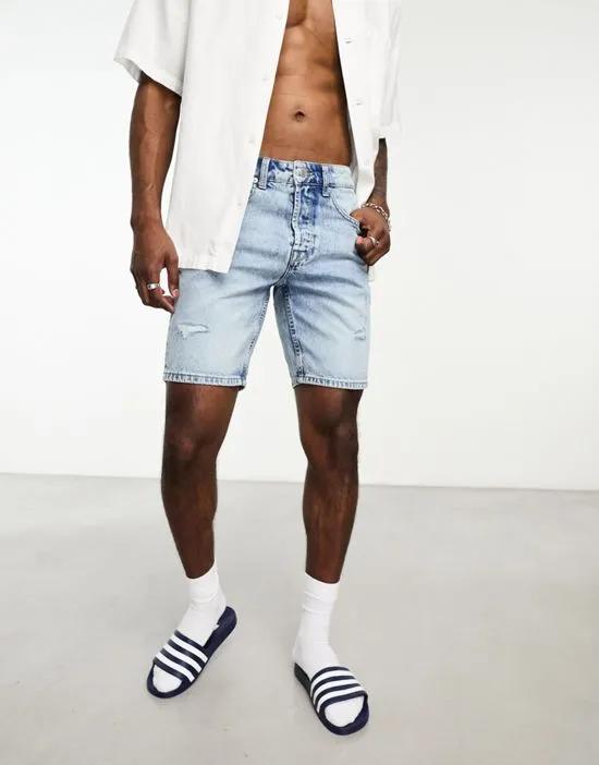 loose fit denim shorts in light wash with abrasions
