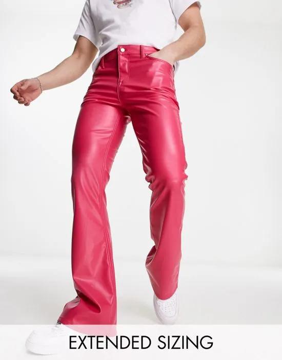 low rise flare jean in bright pink leather look