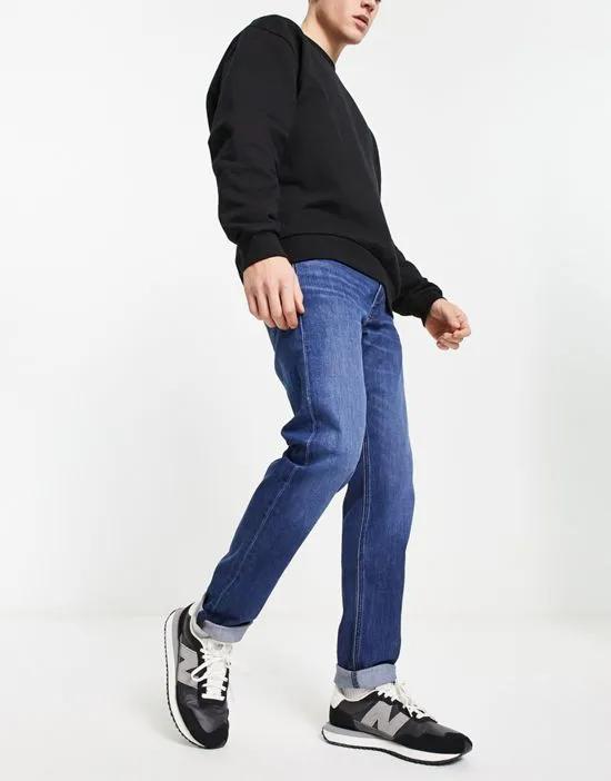Luke slim tapered fit jeans in mid wash