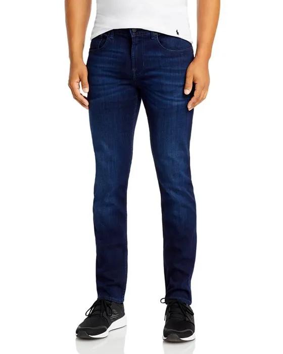Luxe Performance Plus Slimmy Tapered Slim Fit Jeans in Deep Blue