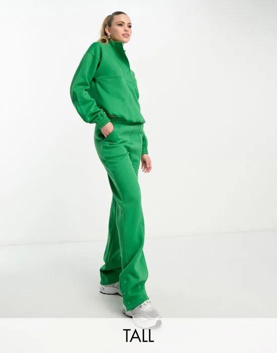 Maddy paneled sweatpants with snaps in green - part of a set