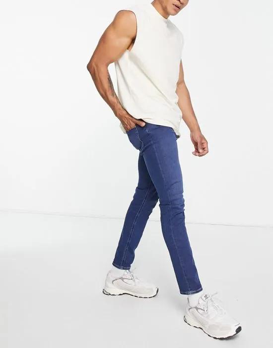 Malone skinny fit jeans in mid wash