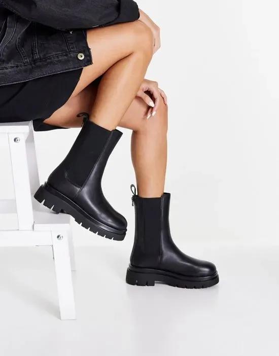 Maple chunky flat calf boots in black