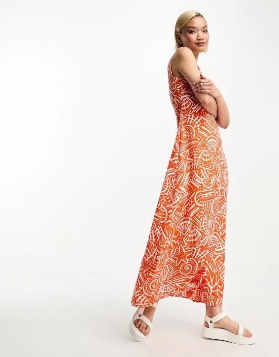 maxi smock dress in orange abstract print