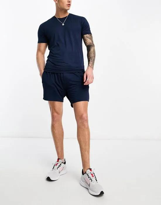 mid length training shorts in navy - part of a set