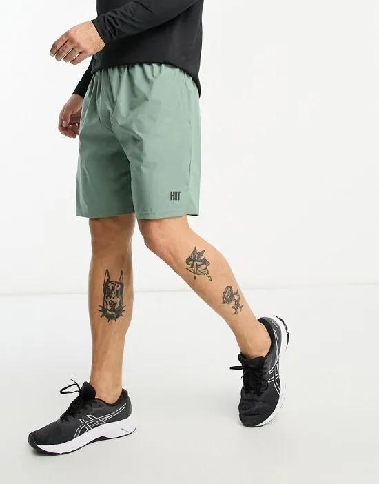 mid length training shorts in sage